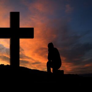 cross-sunset-silhouette-man-kneeling-knee-pray-