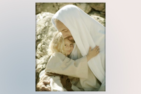 Gesù abbraccia un bambino